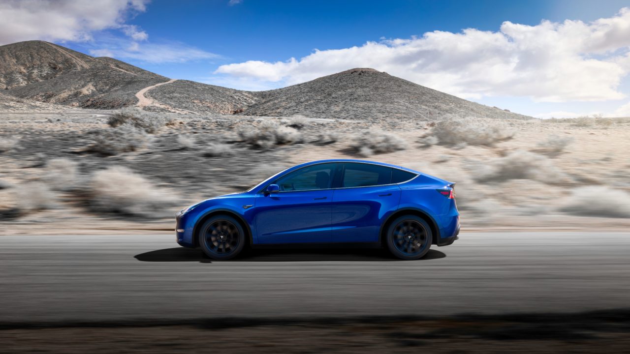Tesla Model Y side blue